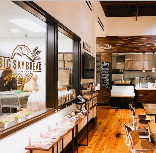 Where is Big Sky Bread Company located? Big Sky Bread has been around for over 25 years in Birmingham, AL. The company started out as a small, local bakery in Mountain Brook Village and is now located in Liberty Park in the SmoothRock building.
