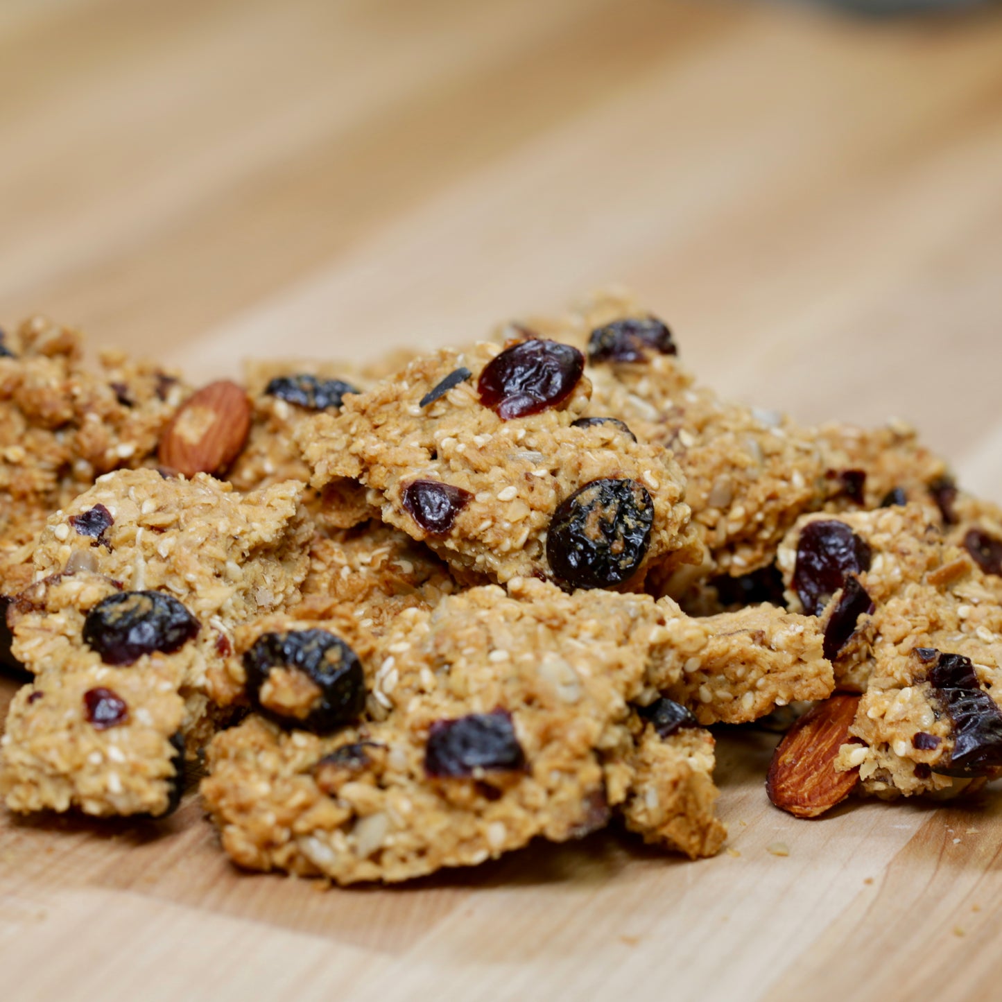 Big Sky Bread Company Whole Grain Granola. A whole grain oatmeal base featuring apple juice sweetened cranberries, California almonds, wildflower honey and a perfect blend of sesame and sunflower seeds.